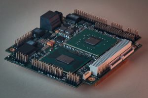 Vehicle And Heavy Equipment image by Seatronx Industrial embedded CPU and heat sink on a marine bridge computer mainboard characterizing the processor specification decision