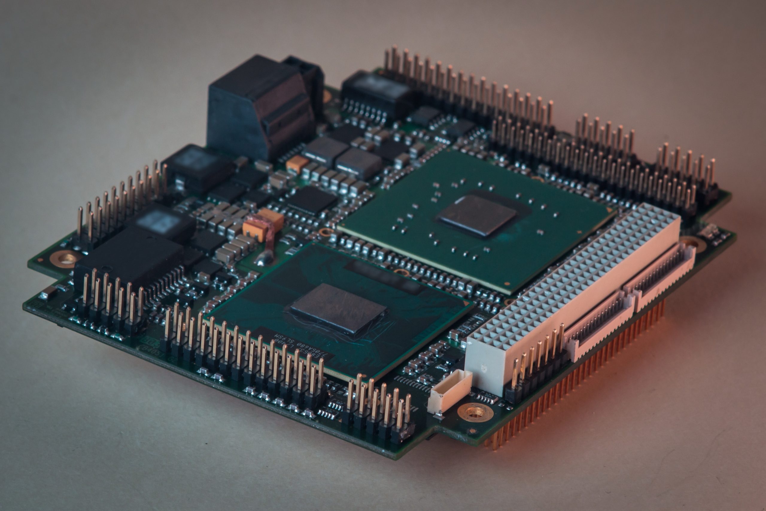 Industrial embedded CPU and heat sink on a marine bridge computer mainboard characterizing the processor specification decision
