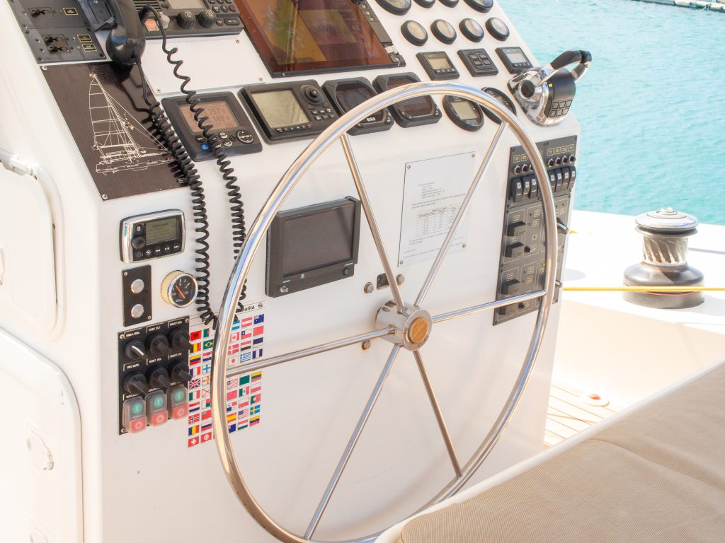 MPC-3800 Series image by Seatronx Rugged marine display flush-mounted at an exposed open helm taking spray, with the sealed front bezel and gasket visible, representing the ingress-protection and IP-rating decision when choosing how waterproof a marine display needs to be for where it mounts.
