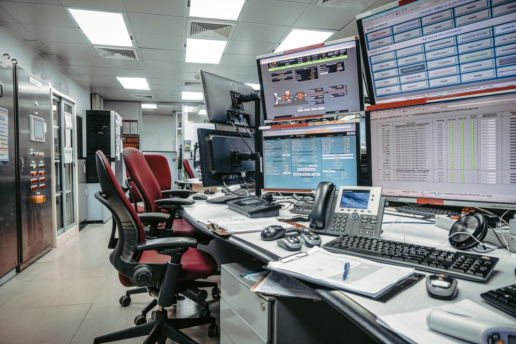 Vehicle And Heavy Equipment image by Seatronx Process control room desk with several monitors, two trackballs and two keyboards at one operator station