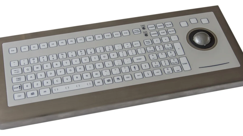 Thruput image by Seatronx Stainless steel washdown industrial keyboard with an integrated trackball, photographed on a white background