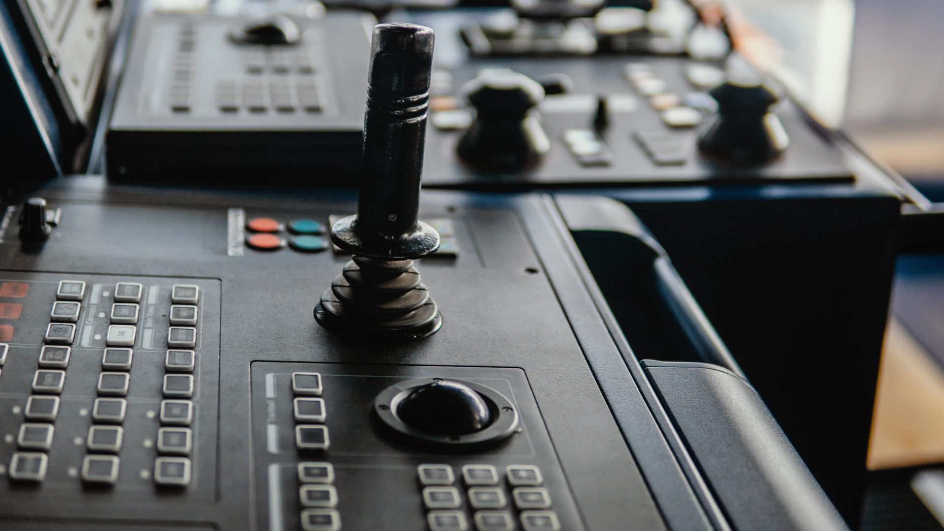 Ship bridge console with a trackball, keypads and a joystick